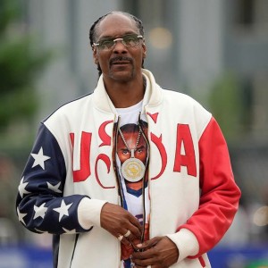 rapper-snoop-dogg-lights-up-u-s-trials-in-sprint-and-commentary-stint